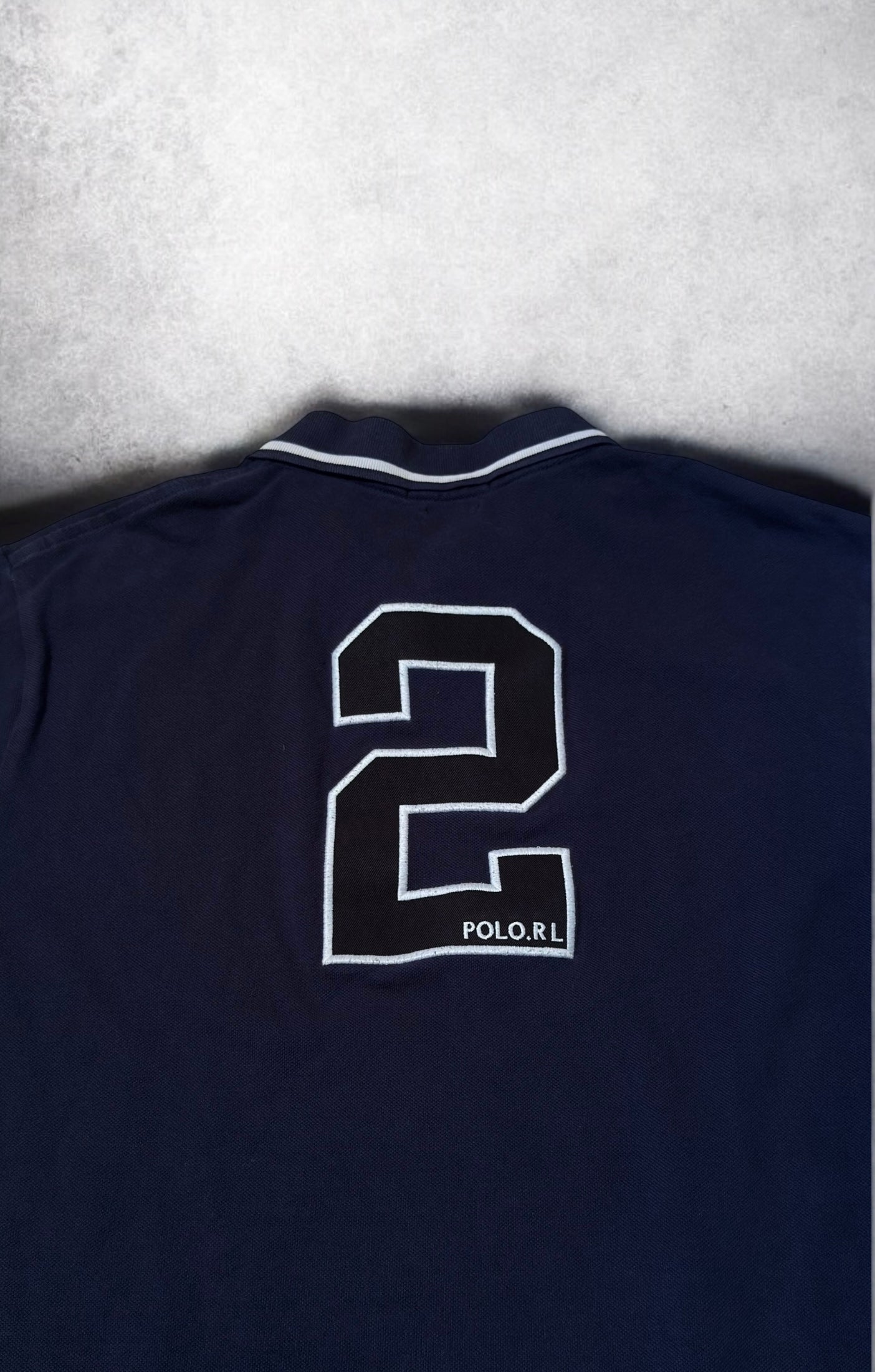 Ralph Lauren Polo (L)