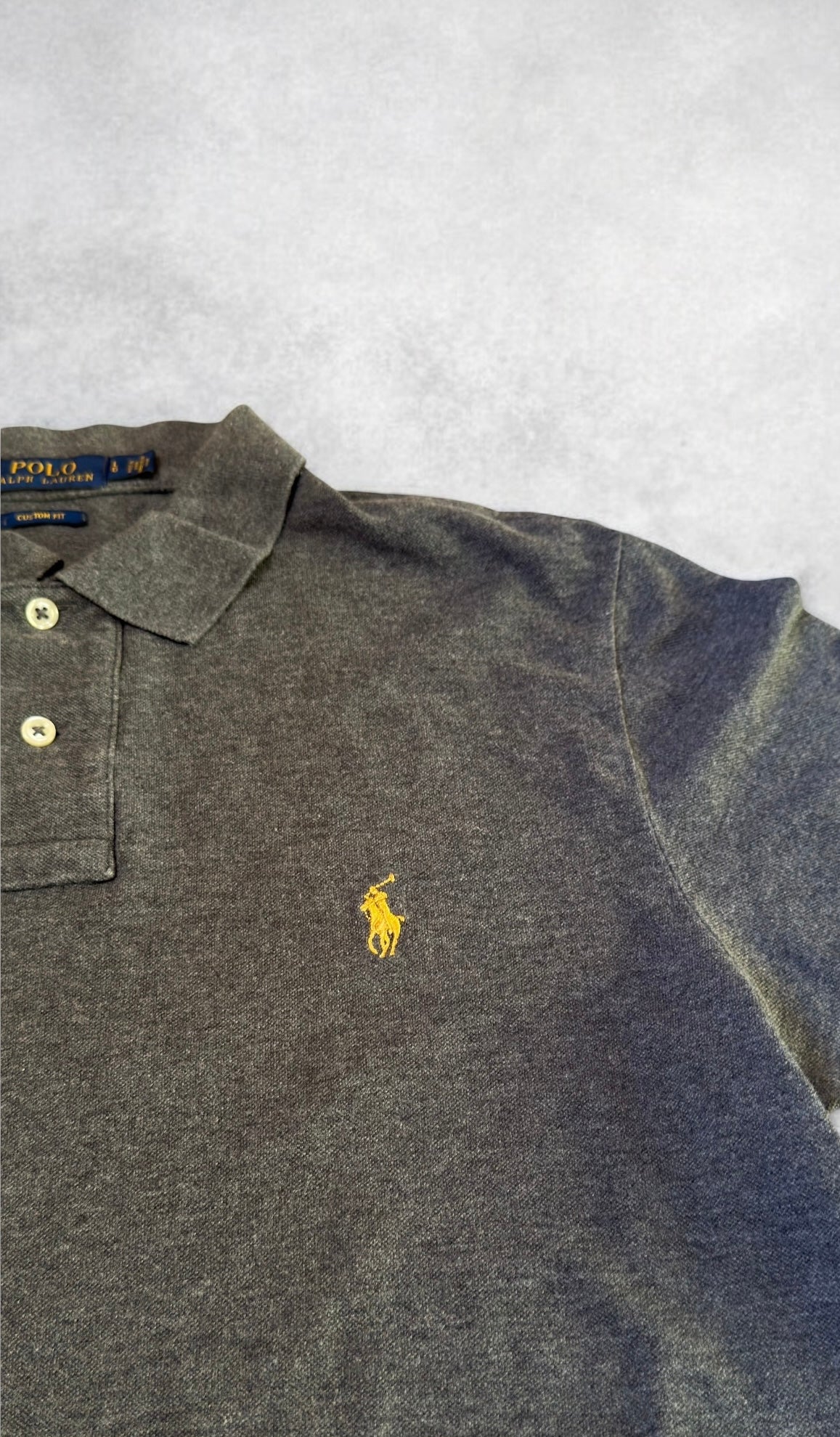 Ralph Lauren Polo (L)