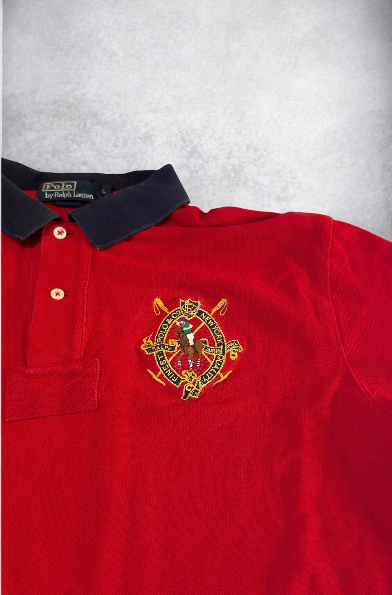 Ralph Lauren Polo (L)
