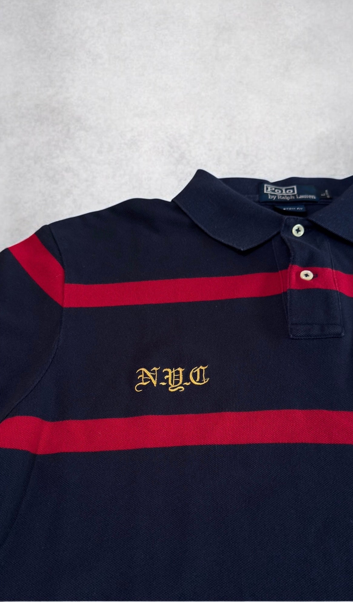 Ralph Lauren Polo (L)